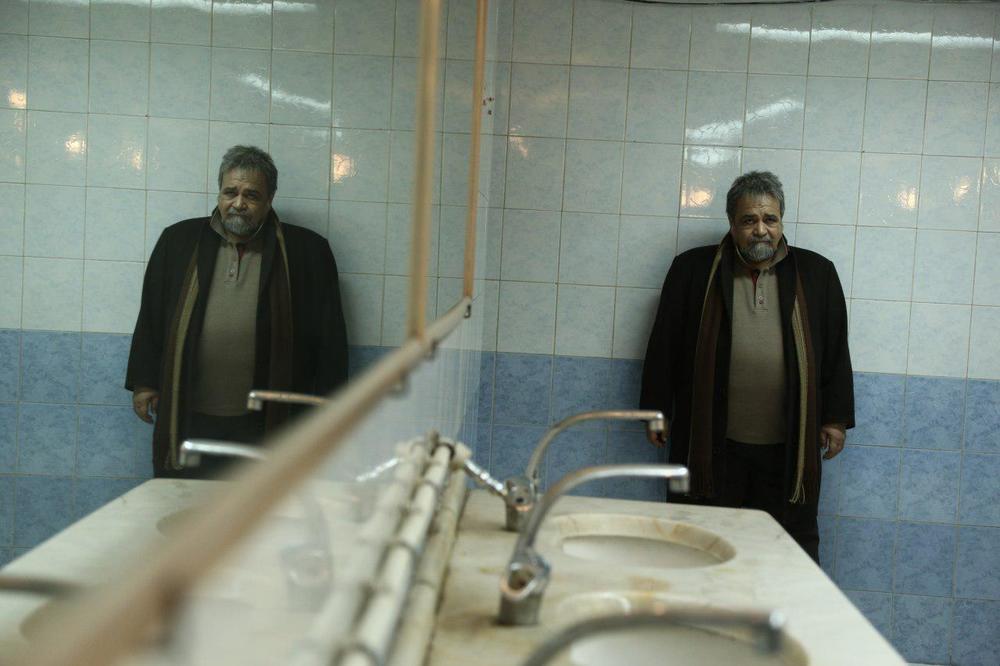 محمدرضا شریفی نیا در فیلم سینمایی «سه بیگانه»