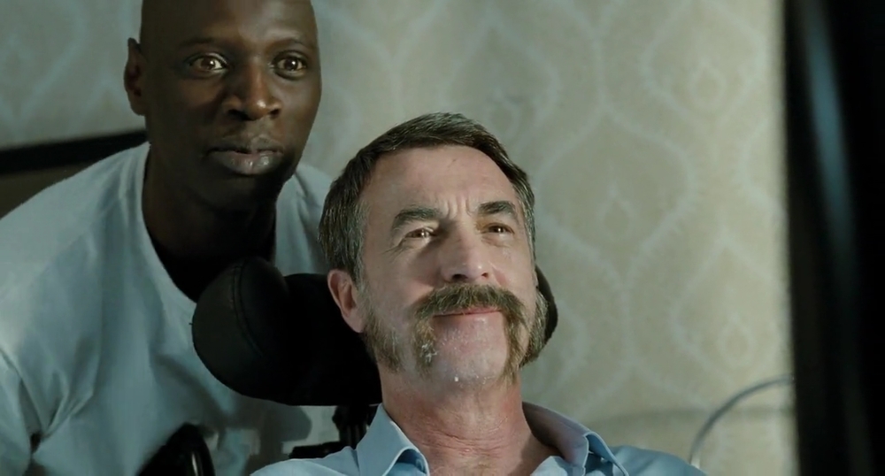 عمر سی و فرانسوا کلوزه در فیلم «دست نیافتنی ها»